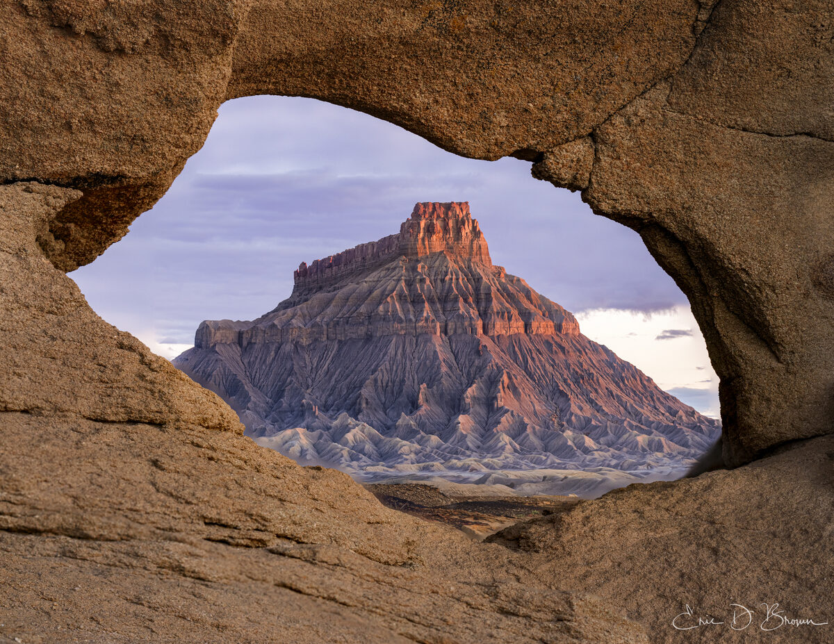 Factory Butte framed by rock